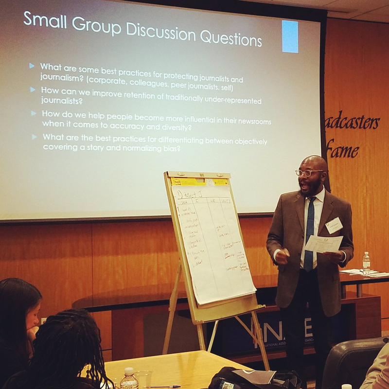 Sharif Durhams, a homepage editor at the Washington Post, reports to the Unity Diversity Caucus on a discussion of how to protect journalists from attacks in the field and online. (Nicki Mayo/Twitter)